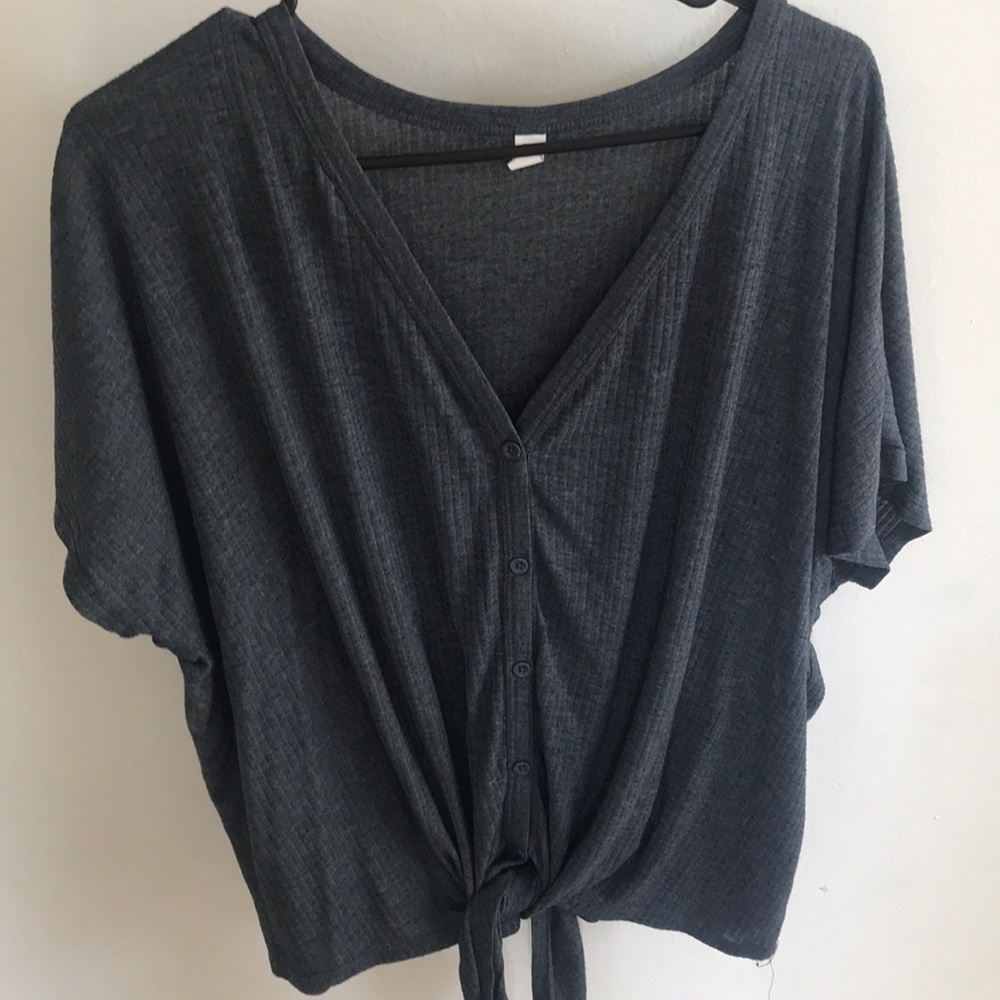 Gray sleeve button up shirt that Ties.